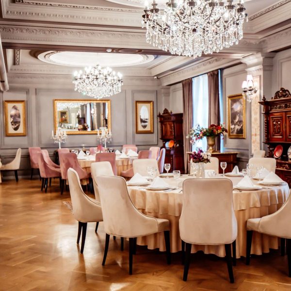 classic luxury style restaurant with tables and chairs